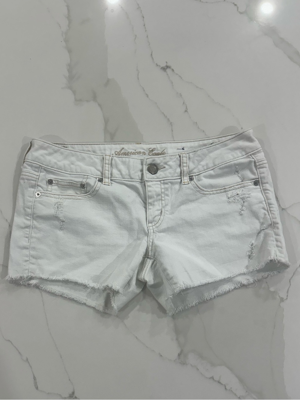 American Eagle White Distressed Shorts